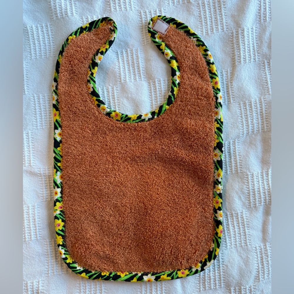 Orange Baby Bib with Floral Daffodil Trim